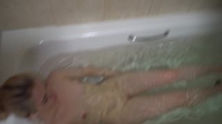 Interrupting her bath for a quick blowjob